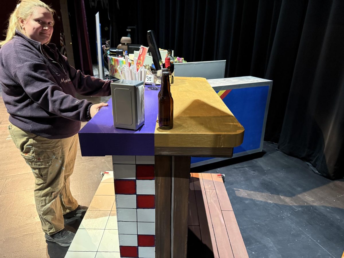 Zoe Speers showcasing a half fast food counter half bar which will be needed for working as it involves man different occupations