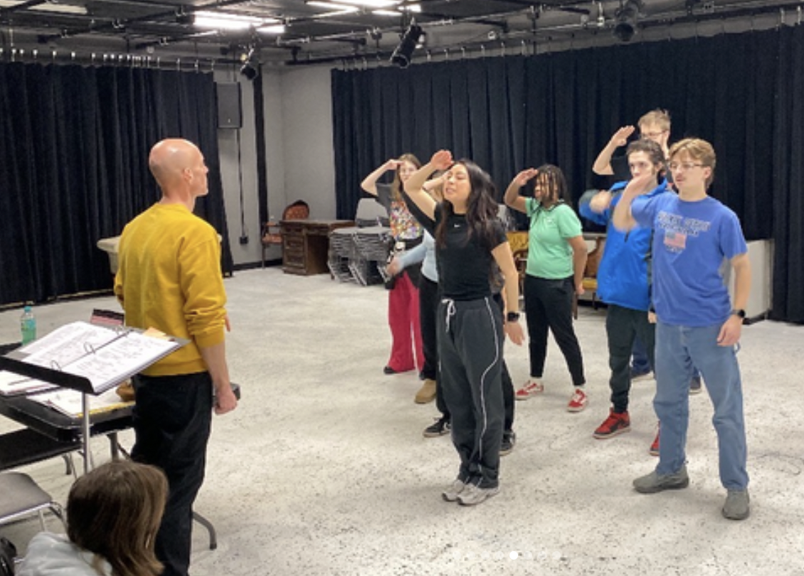 The students prepare to perform "Working."