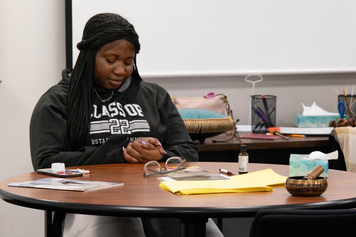 Student meditating during Tuesday meditation