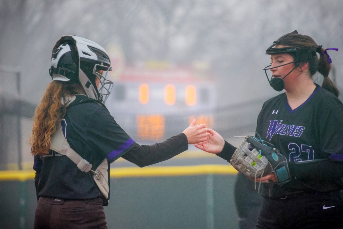 Sophomore Lea Herkel visiting the mound during a game on March 3, 2026 against Moraine Valley. The Wolves fell short 8-4.