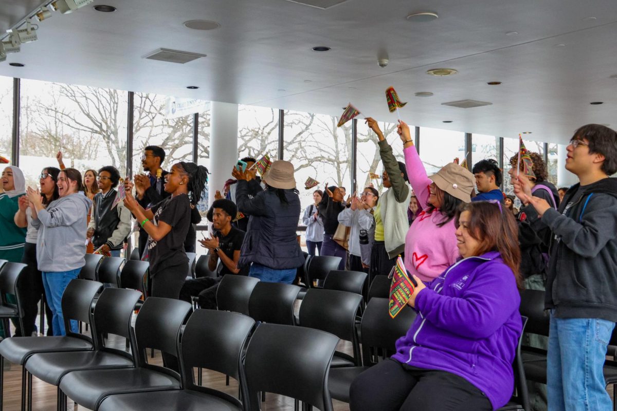 Students take part of Joliet Junior College's Black History Month Flag Raising Padre through the college on February 5 2026.