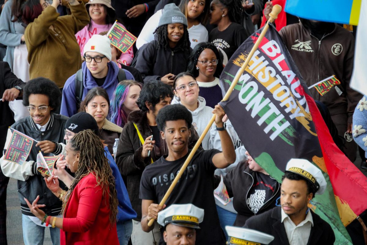 Students take part in Joliet Junior College's Black History Month Flag Raising Parade through the college on Feb. 5, 2026.