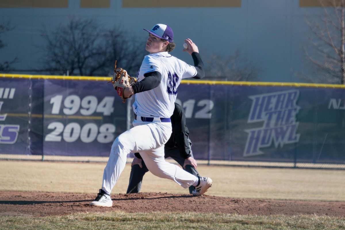 Sophomore Joey Cortese making a pitch on Feb. 18, 2026 in a game against Prairie State College.