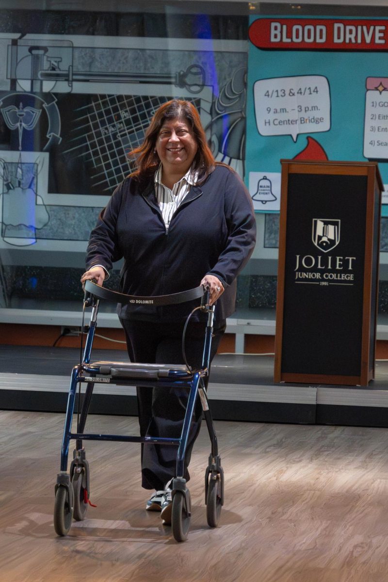 JJC career coach, Aida Martinez, walking the 'Dress for Success' business professional fashion show on March 5, 2026.