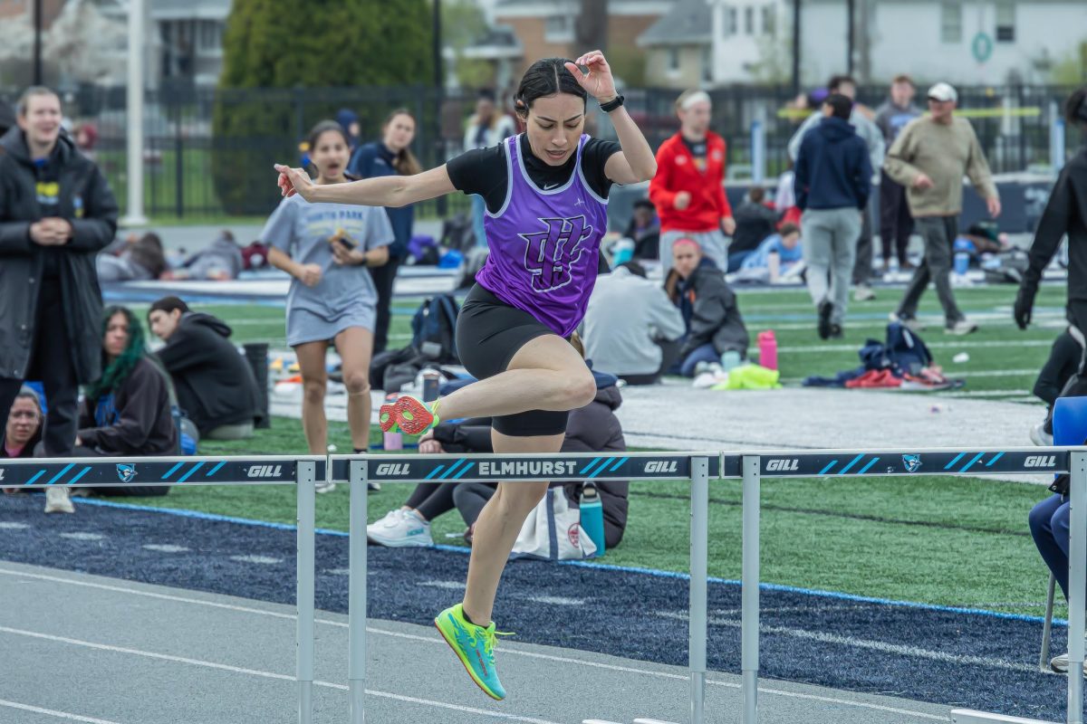 Freshmen Val Ibarra competes in the 400m hurdles at the Chicagoland Championships in Elmhurst Ill on April 11, 2026.