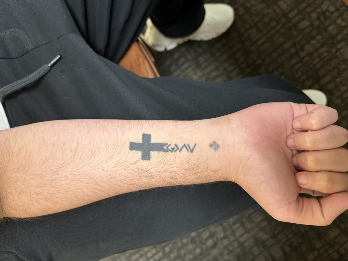 JJC student Kerolos Hana shows off his first tattoo. 
