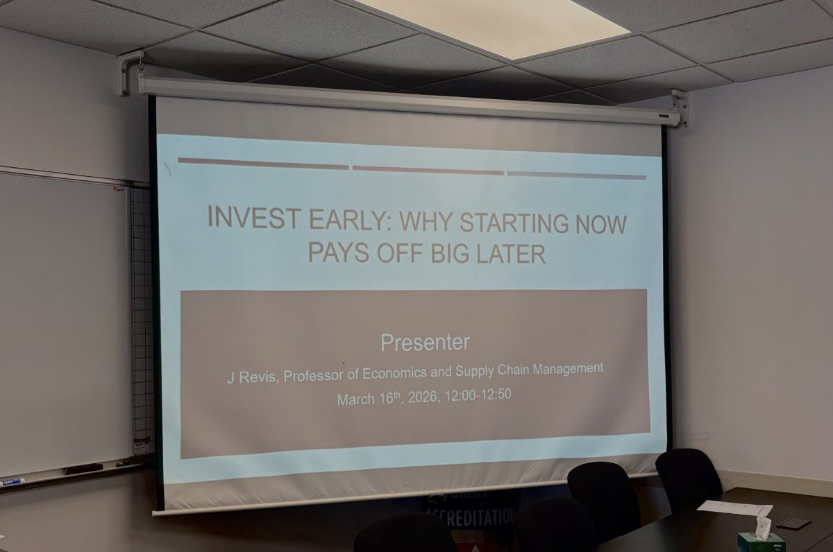 J Revis presented investing advice to students on March 16, 2026. 