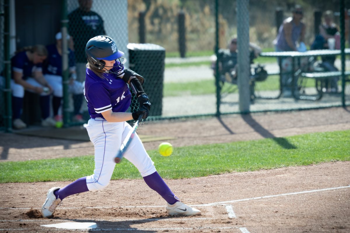 Sophomore pitcher Karli McMillin hitting against Oakton College on March 3, 2026. McMillin pitched 7 innings and had 2 strikeouts and let up 1 hit. She also put up a RBI at the plate. The Wolves took the victory 5-0.