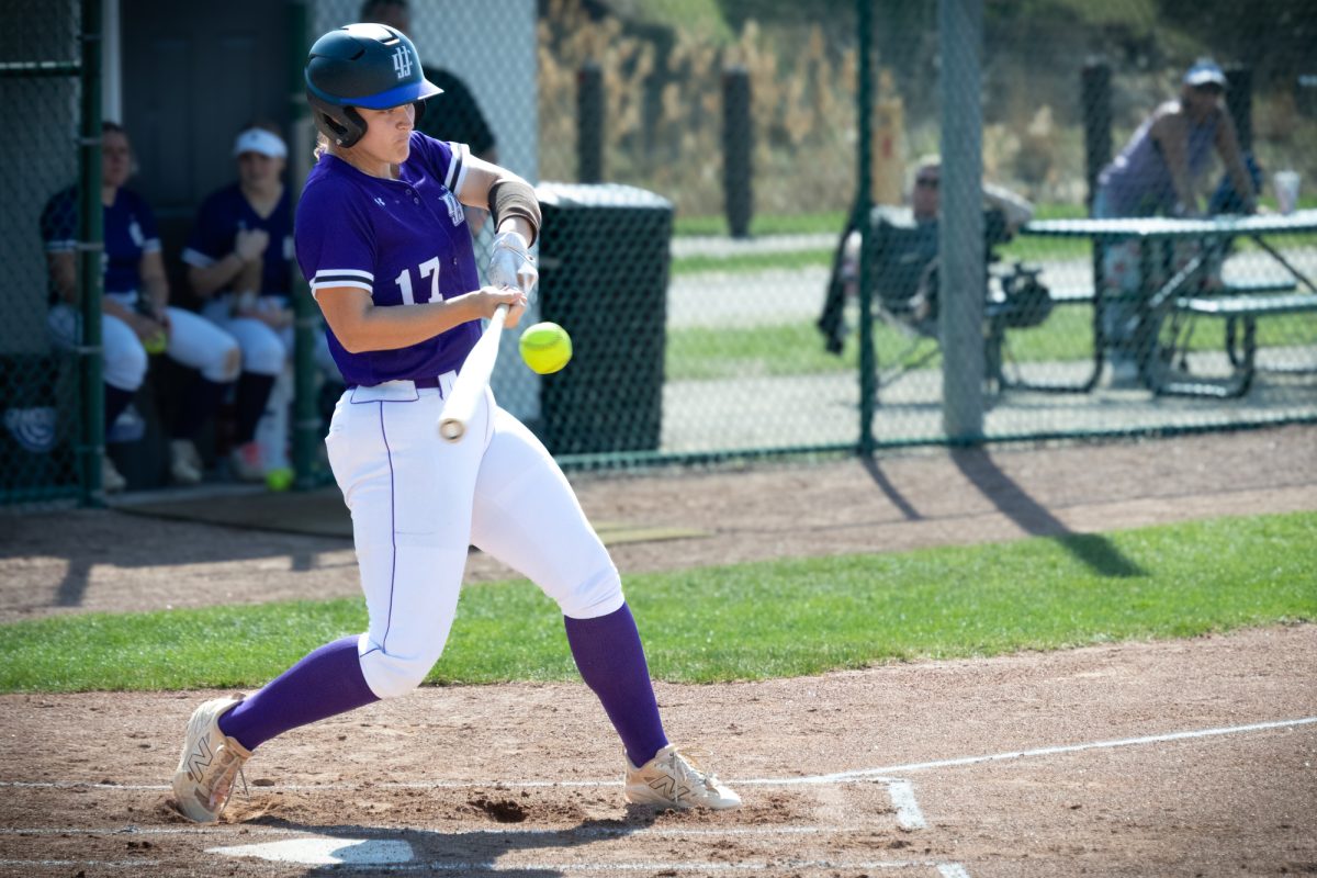 Sophomore Skylar Welcome striking the ball against Oakton College on March 3, 2026. Welcome had a double, triple, and 2 RBI's. The Wolves took the victory 5-0.