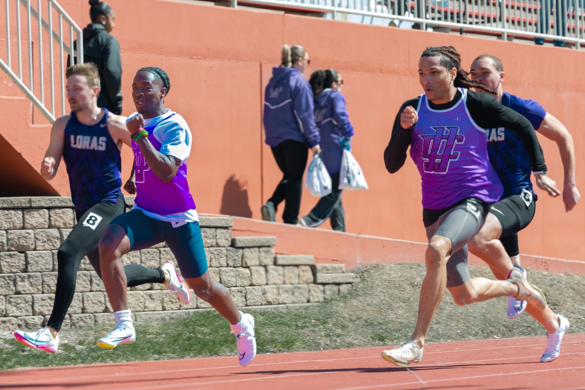Freshmen Benjamin Boatey (left) and Juelz Jones (right) competing in the 100-meter dash at North Central College First Chance Invitational on March 28, 2026. Boatey placed 42th and Jones placed 40th overall.