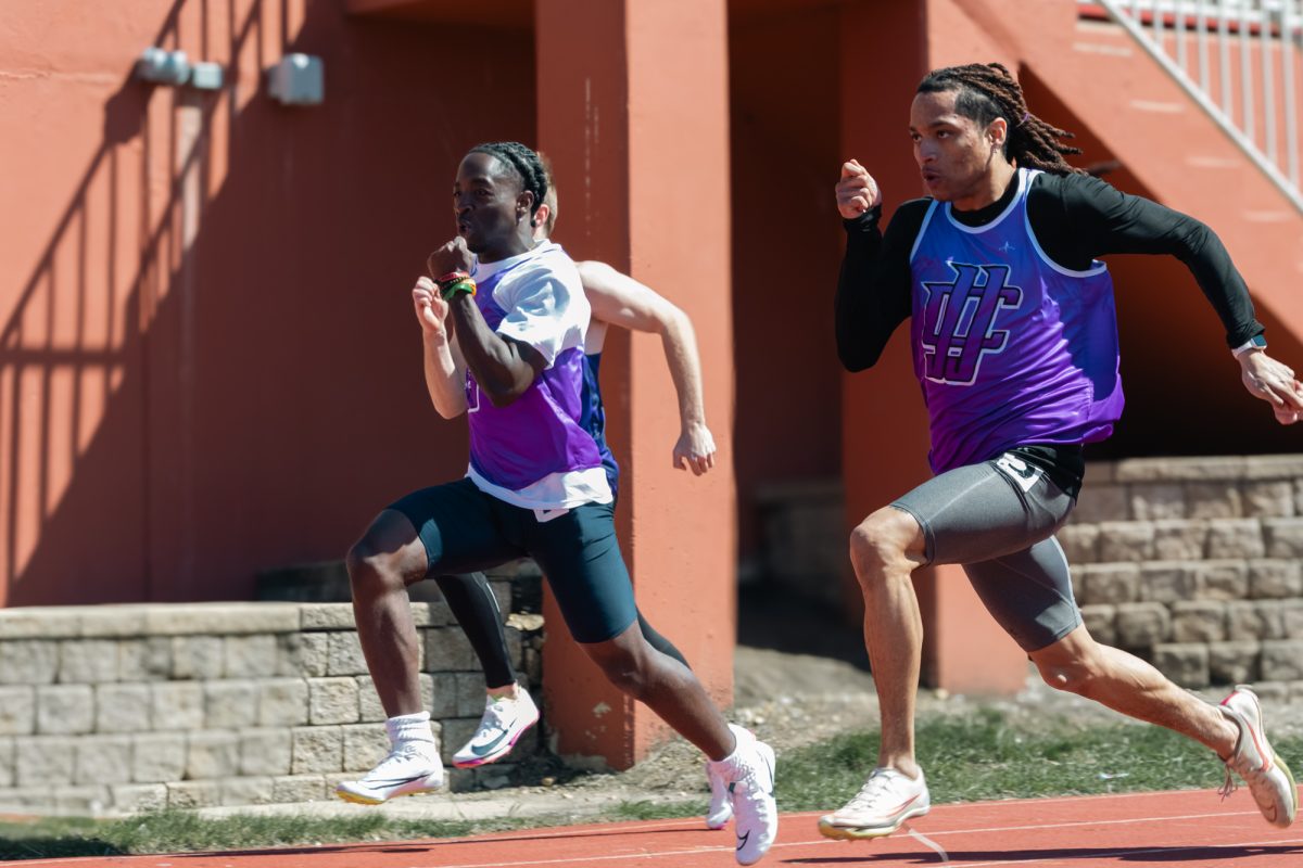 Freshmen Benjamin Boatey (left) and Freshmen Juelz Jones (right) compete in the 100-meter dash at North Central College First Chance Invitational on March 28, 2026. Boatey placed 42th and Jones placed 40th.