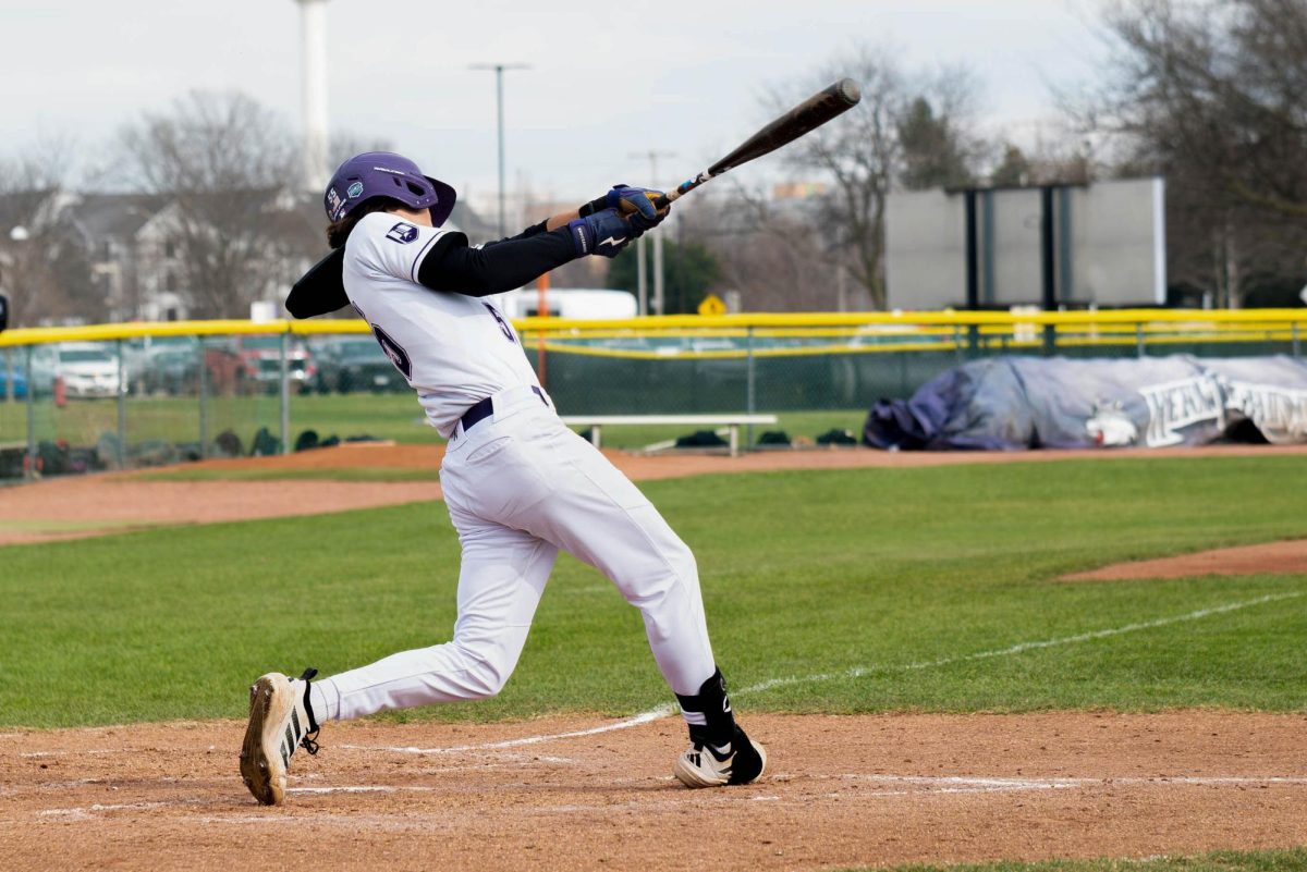 Freshman Will Withers swinging to hit the ball on Tuesday, March 24, 2026 during a Baseball game against Kankakee Community College. The Wolves won 4-3.