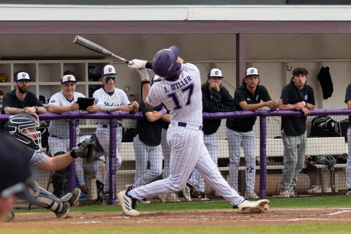 Sophomore Jacob Miller swinging to hit the ball on Thursday, April 9, 2026 during a Baseball game against vs South Suburban College. The Wolves won 8-2.