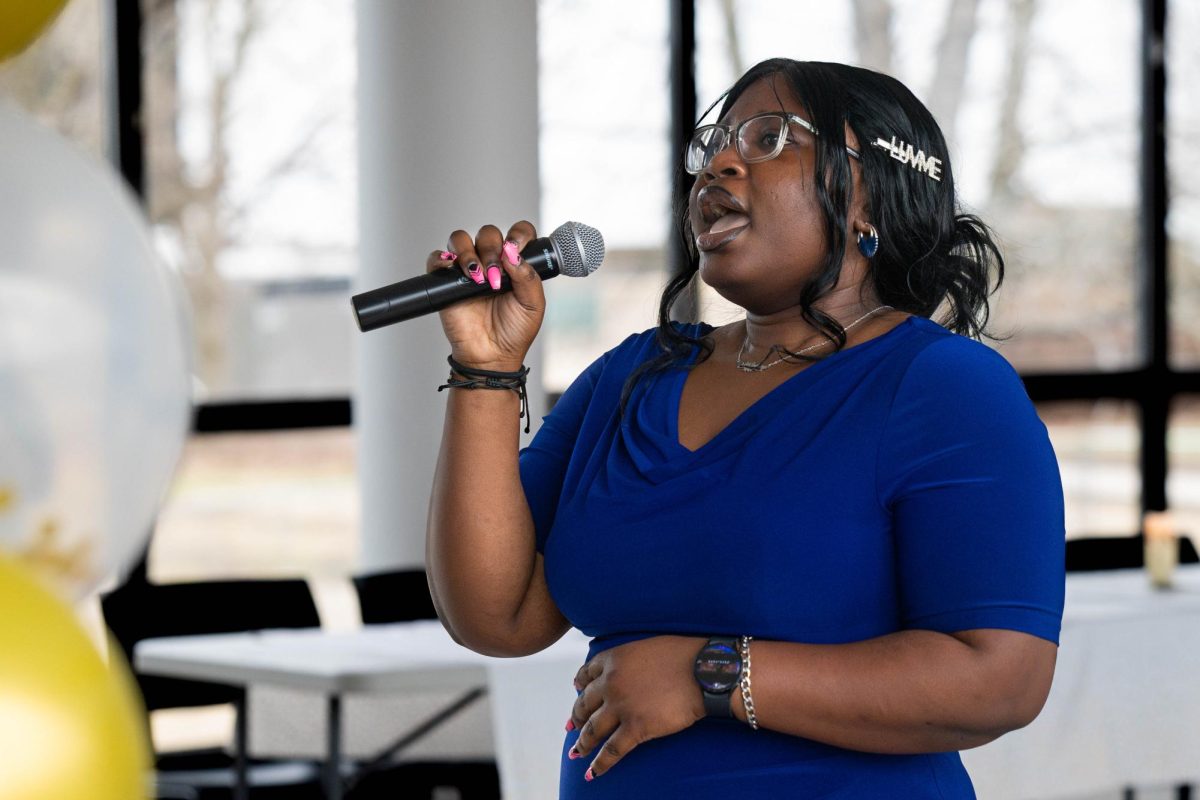 Shulamite Somefun singing karaoke at the Eid al-Fitr celebration on March 26, 2026.