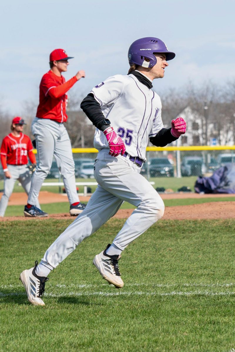 Sophomore Joshua Mcguigan running to the base on Tuesday, March 24, 2026 in a Baseball game against Kankakee Community College. The Wolves won 4-3.