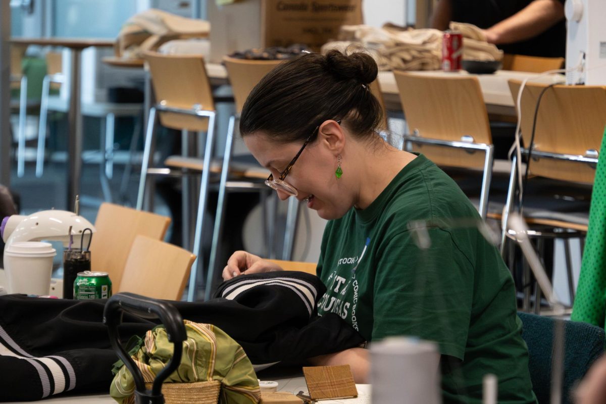 Ashley Middleton sewing during the Repair Cafe at Romeoville campus on April 18, 2026.