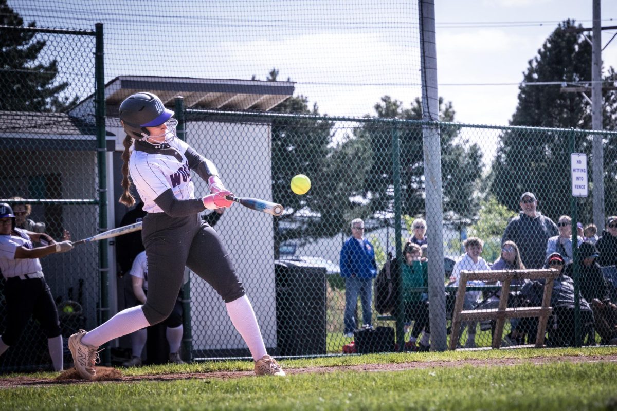 Sophomore Ashlyn Pacchetti striking the ball to bring home two runs on April 28, 2026. The Wolves captured the victory against Kishwaukee College in 5 innings 10-0 on their sophomore night.